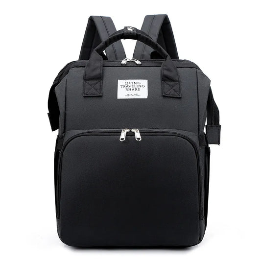 Black backpack with a visible brand label on a white background