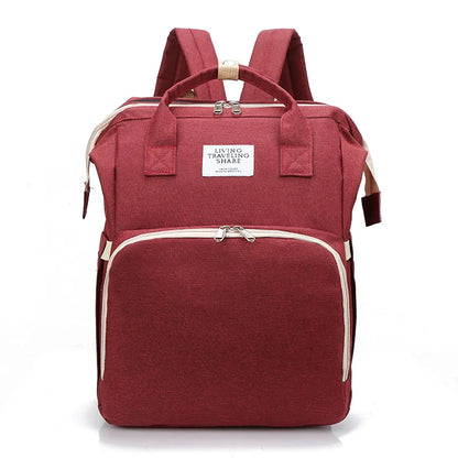 Red backpack with white accents on a white background